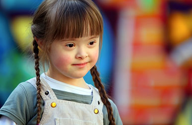 Small girl with Downs Syndrome